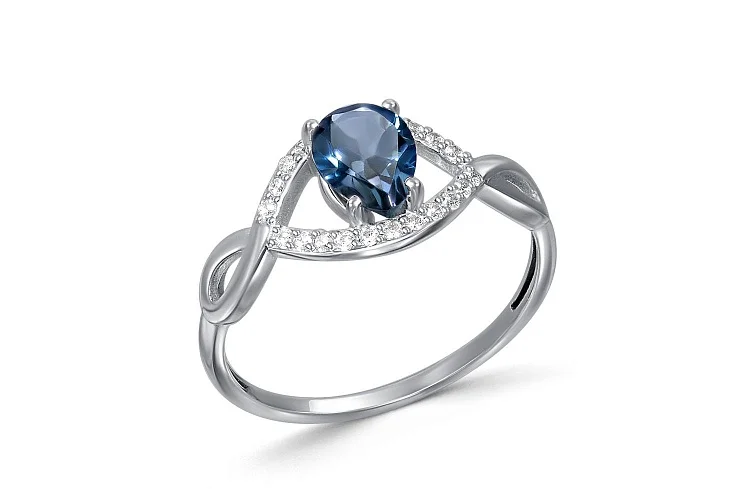 Кольцо из белого золота с топазом лондон и 22 фианитами