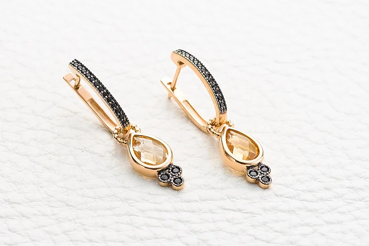 Серьги-трансформеры из красного золота с 2 цитринами и 32 фианитами