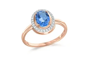 Кольцо из красного золота с топазом swiss и 26 фианитами