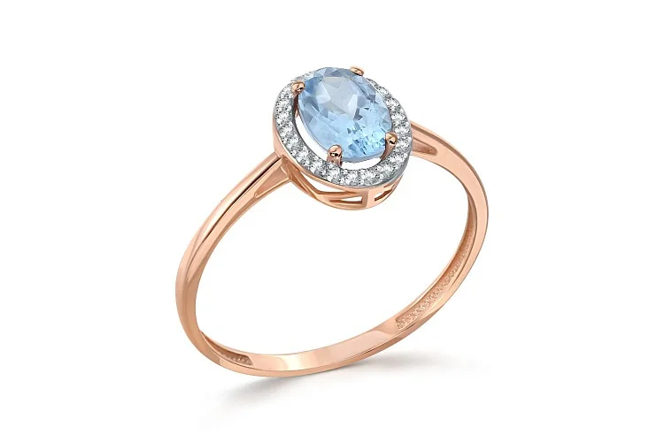 Кольцо из красного золота с топазом sky и 22 фианитами
