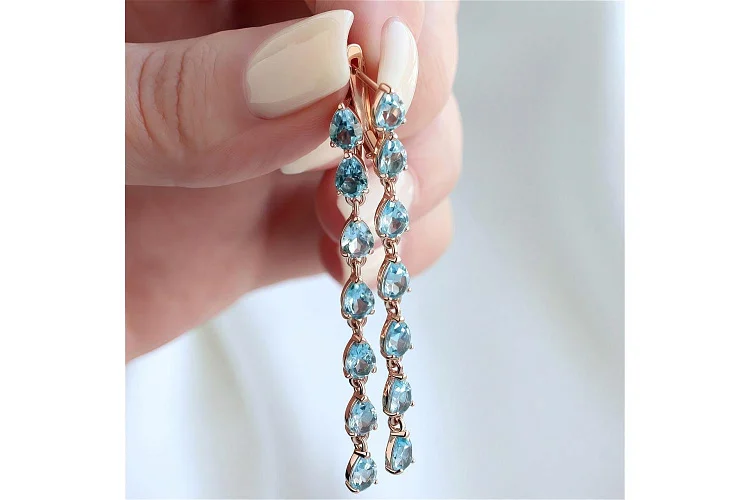 Серьги Дорожки из красного золота с 14 топазами swiss