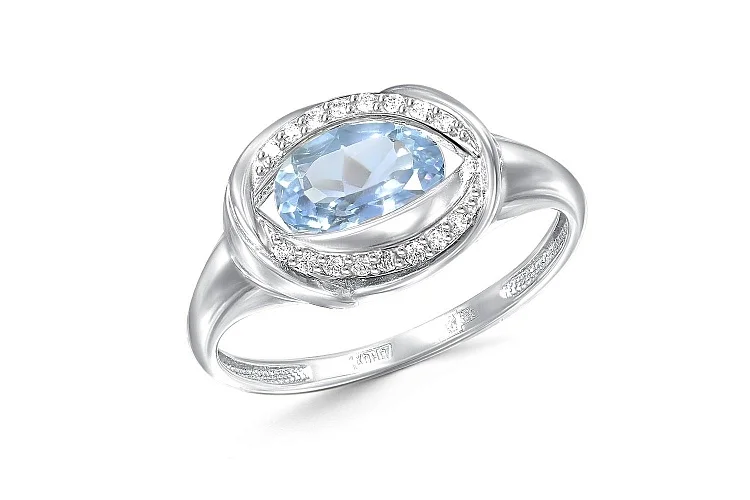 Кольцо из белого золота с топазом sky и 16 фианитами