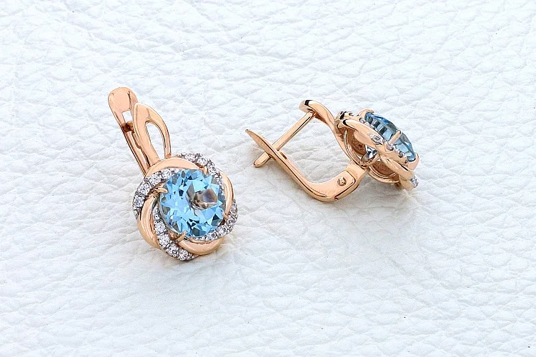 Серьги из красного золота с 2 топазами sky и 32 фианитами