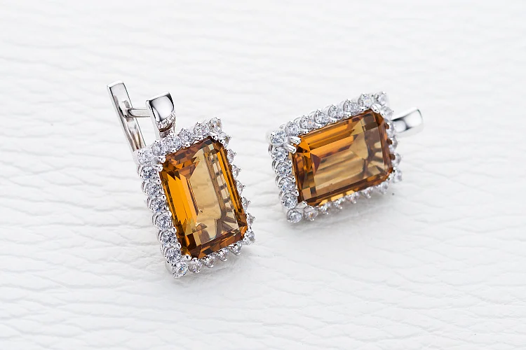 Серьги из белого золота с 2 султанитами и 48 фианитами