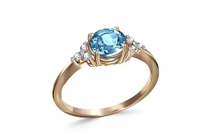 Кольцо из красного золота с топазом swiss и 6 фианитами