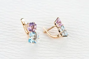 Серьги из красного золота с 2 топазами sky и 2 аметистами