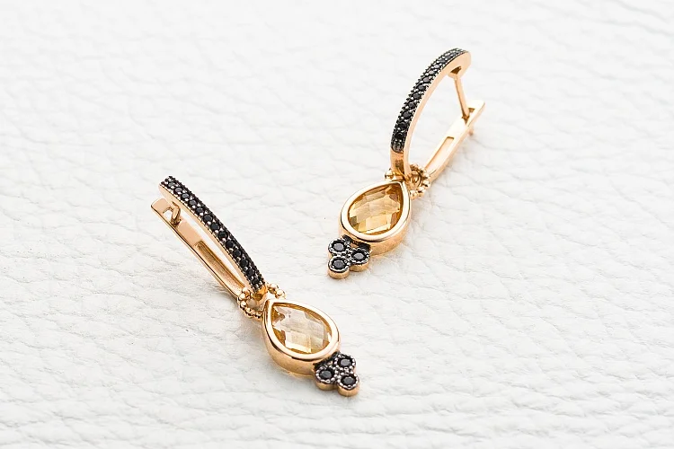 Серьги-трансформеры из красного золота с 2 цитринами и 32 фианитами