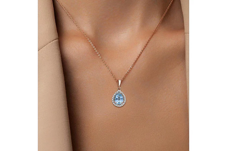 Подвеска из красного золота с топазом sky и 22 бриллиантами