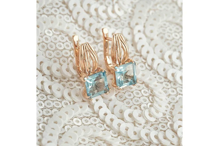 Серьги из красного золота с 2 топазами sky