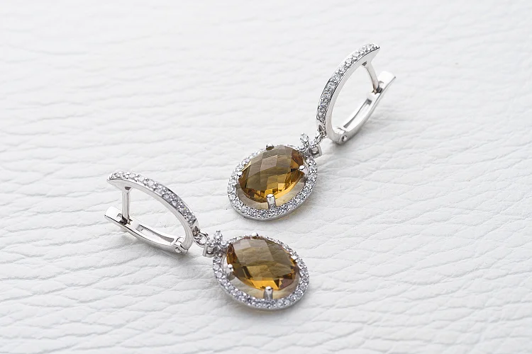 Серьги из белого золота с 2 султанитами и 74 фианитами