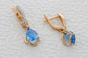 Серьги из красного золота с 2 топазами swiss
