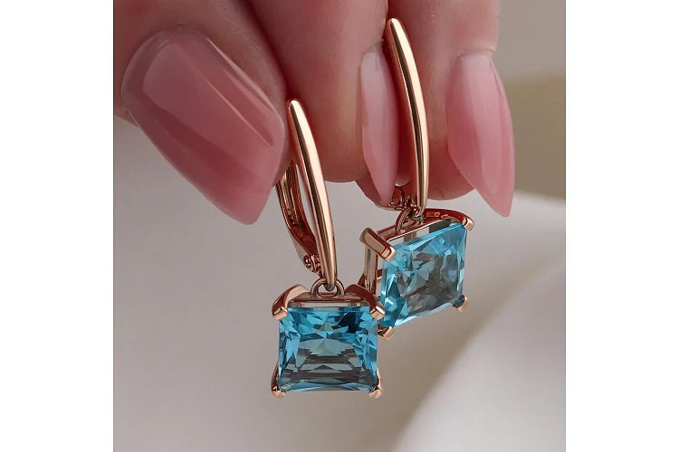 Серьги из красного золота с 2 топазами swiss