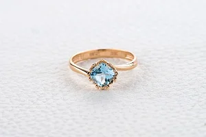 Кольцо из красного золота с топазом sky