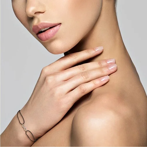 Браслет Бесконечность из красного золота с 5 фианитами