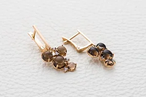 Серьги из красного золота с раухтопазами, хризолитами и цитринами