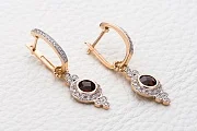 Серьги-трансформеры из красного золота с 2 гранатами и 66 фианитами