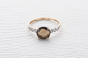 Кольцо из красного золота с раухтопазом и 6 фианитами