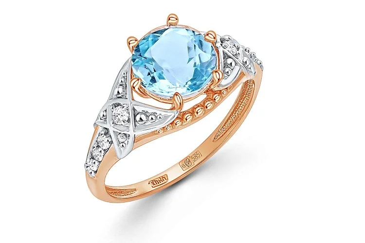 Кольцо из красного золота с топазом sky и 8 фианитами
