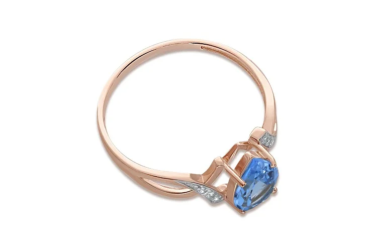 Кольцо из красного золота с топазом swiss и 6 фианитами
