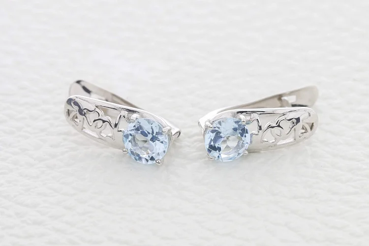Серьги из белого золота с 2 топазами sky