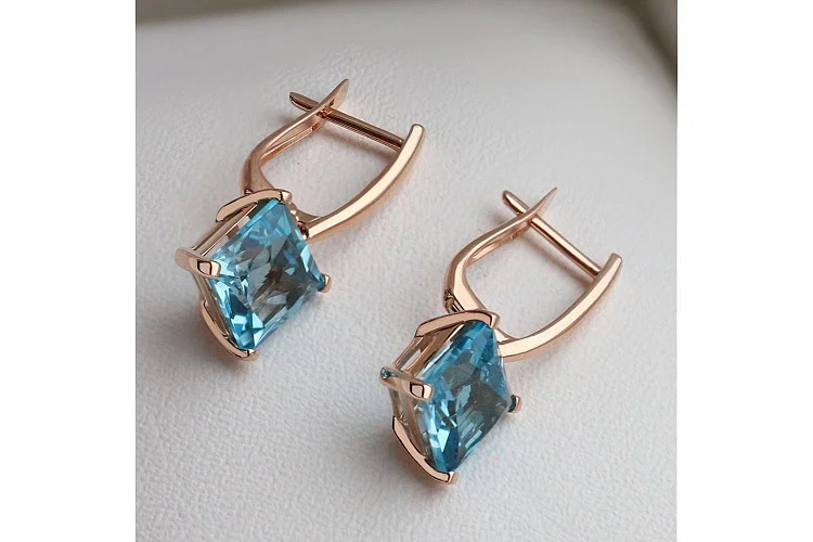 Серьги из красного золота с 2 топазами swiss