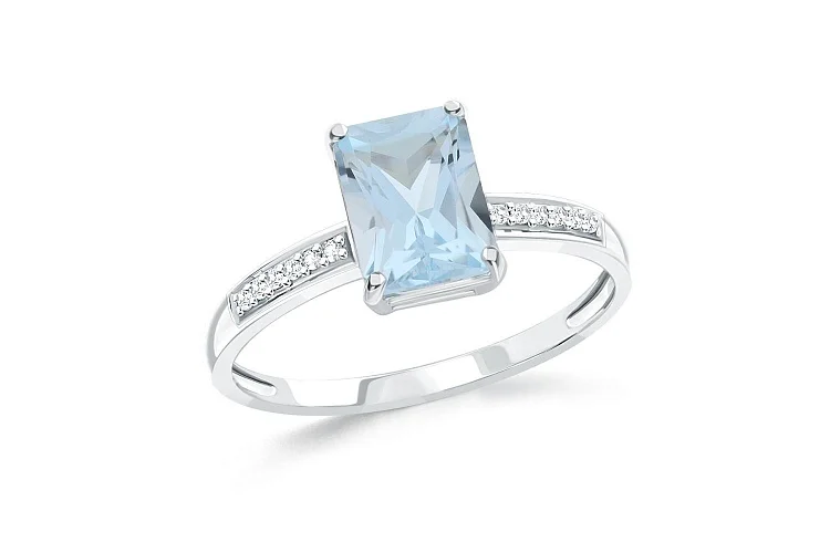 Кольцо из белого золота с топазом sky и 12 бриллиантами