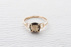 Кольцо из красного золота с раухтопазом