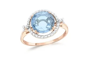 Кольцо из красного золота с топазом sky и 32 фианитами