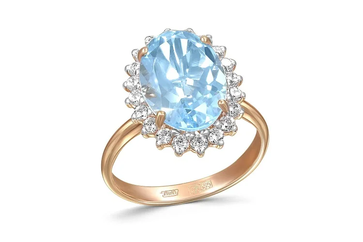 Кольцо из красного золота с топазом sky и 20 фианитами