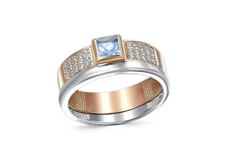 Кольцо из красного золота с топазом sky и 30 фианитами