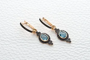 Серьги-трансформеры из красного золота с 2 топазами swiss и 70 фианитами