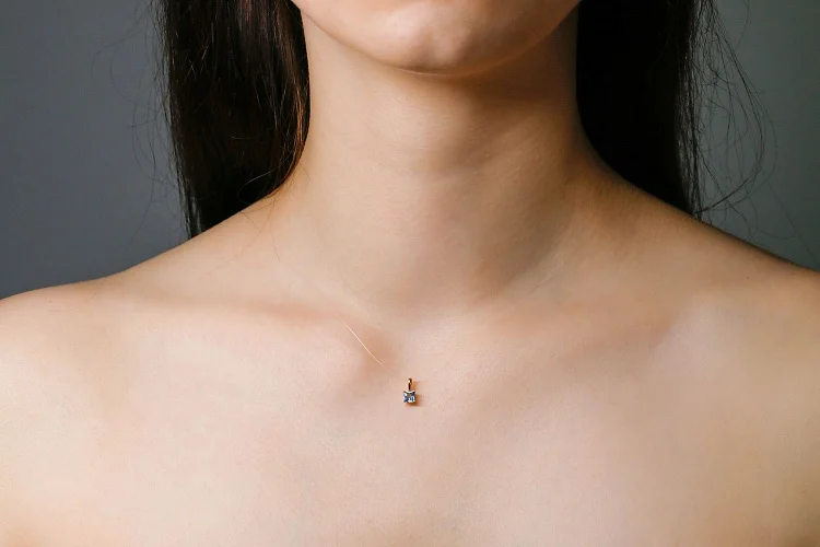 Подвеска из красного золота с топазом swiss