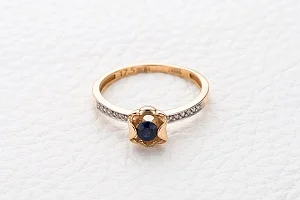 Кольцо Цветок из красного золота с сапфиром и 12 бриллиантами