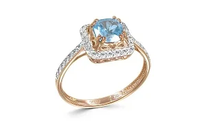 Кольцо из красного золота с топазом swiss и 34 фианитами