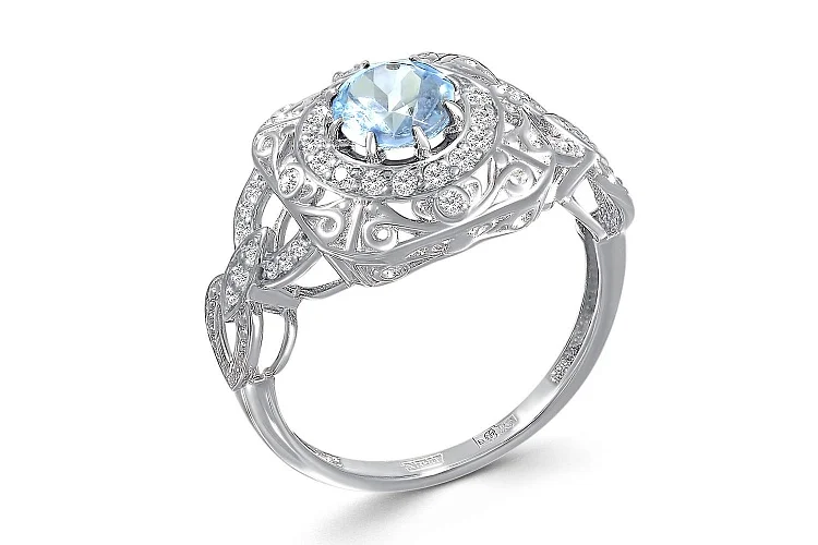 Кольцо из белого золота с топазом sky и 39 бриллиантами
