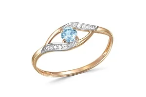 Кольцо из красного золота с топазом swiss и 8 фианитами