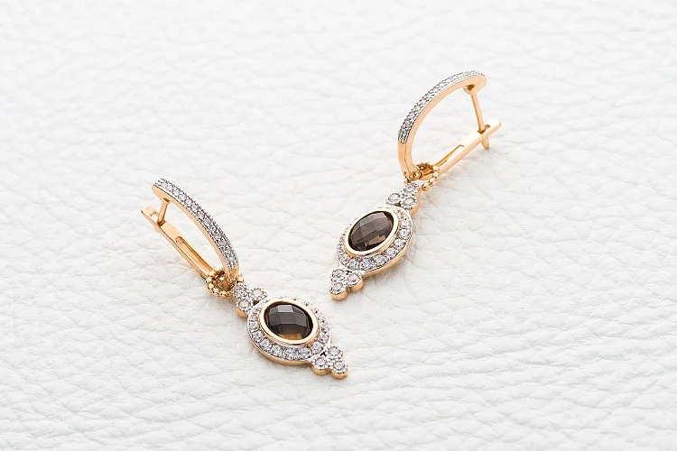 Серьги-трансформеры из красного золота с 2 раухтопазами и 70 фианитами