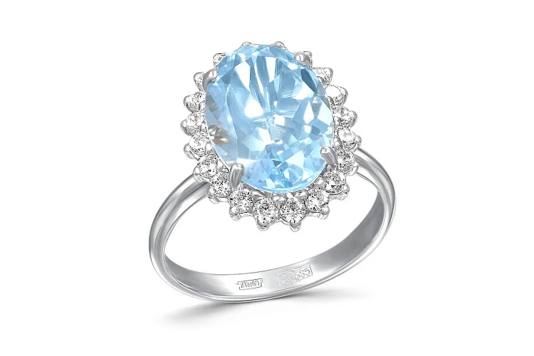 Кольцо из белого золота с топазом sky и 20 фианитами