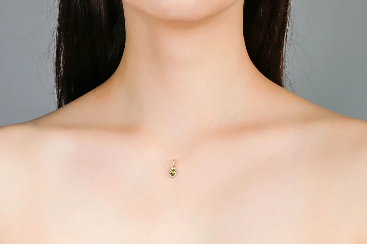 Подвеска из красного золота с хризолитом и 19 фианитами