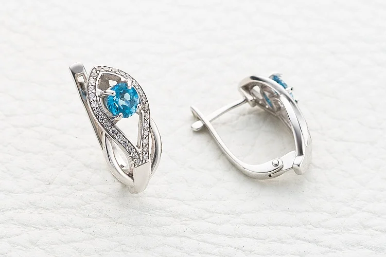 Серьги из белого золота с 2 топазами swiss и 58 фианитами