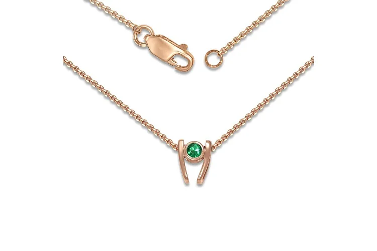 Колье из красного золота с изумрудом