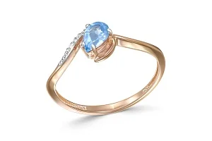 Кольцо из красного золота с топазом swiss и 6 фианитами