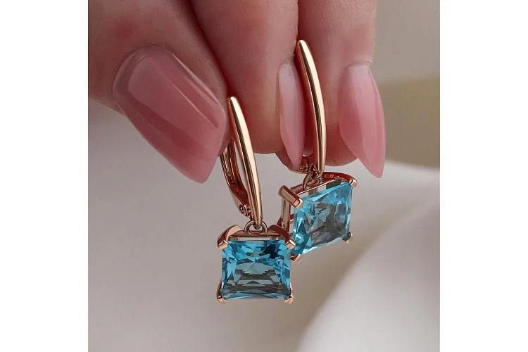 Серьги из красного золота с 2 топазами swiss