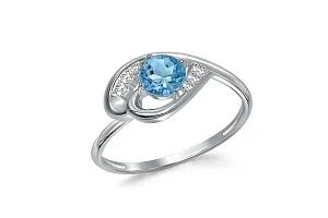 Кольцо из белого золота с топазом swiss и 6 фианитами