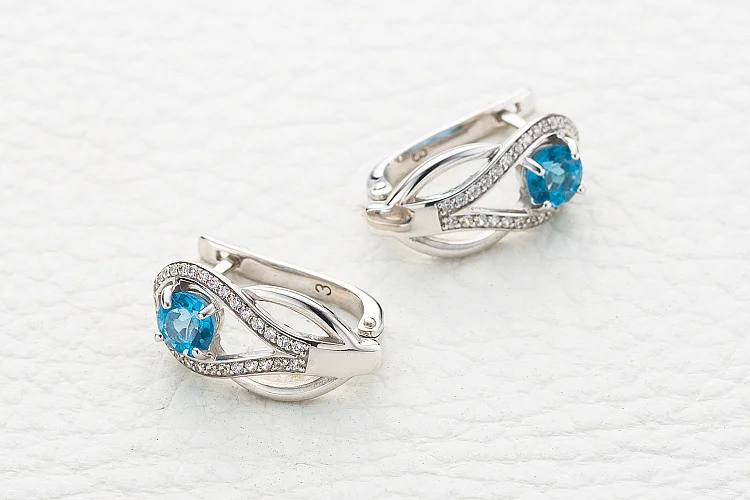 Серьги из белого золота с 2 топазами swiss и 58 фианитами