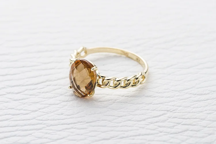 Кольцо из жёлтого золота с султанитом