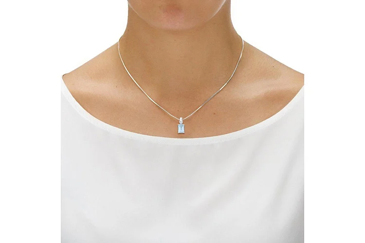 Подвеска из белого золота с топазом sky и 3 бриллиантами