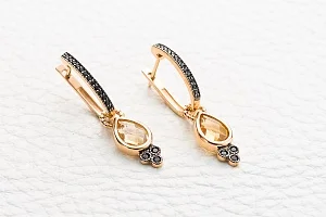 Серьги-трансформеры из красного золота с 2 цитринами и 32 фианитами