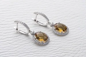 Серьги из белого золота с 2 султанитами и 74 фианитами