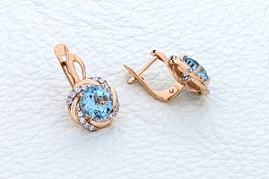Серьги из красного золота с 2 топазами sky и 32 фианитами